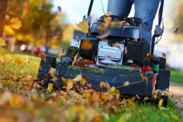 Electric lawn mower slows down when cutting